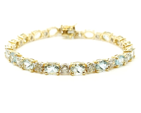 Oval Aquamarine And Round Diamond Bracelet In 14k Yellow Gold