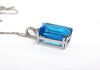 Extraordinary Collection Emerald Cut Swiss Blue Topaz and Diamond Pendant Ad No. 4056