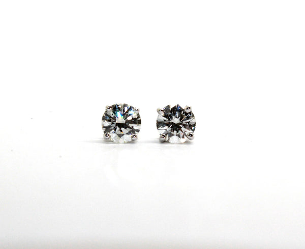 Four Prong Round Brilliant Diamond Stud Earrings In 14K White Gold (2 Ct. tw.)